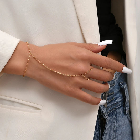 Chain bracelet finger rings gold color