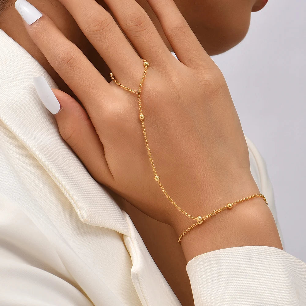 Chain bracelet finger rings gold color