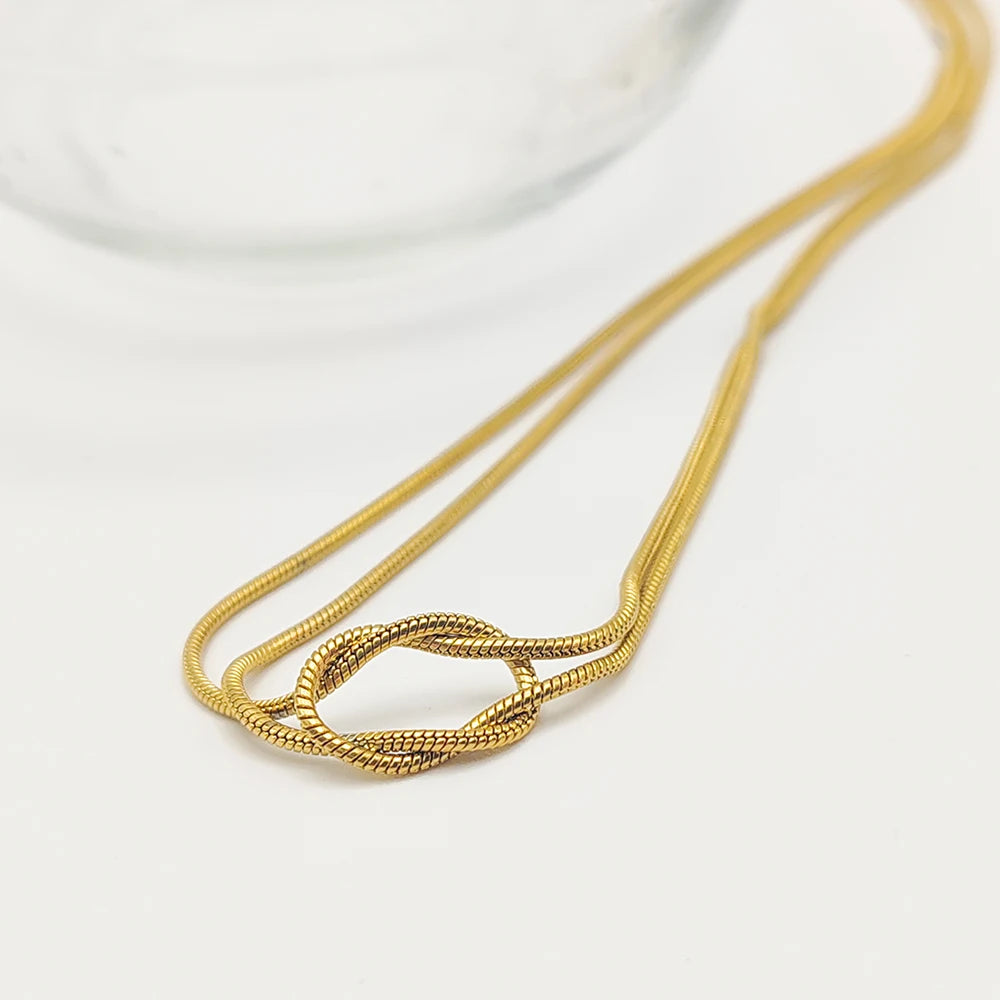 Elegant and minimalist jewelry without shine 14k gold plated snake chain necklace with knot women's stainless steel accessories